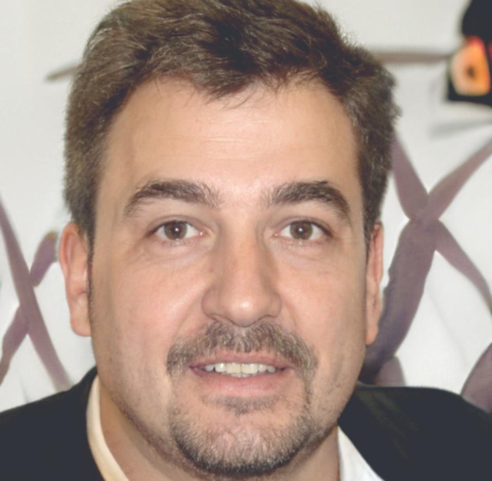 Professional headshot of budget planning specialist