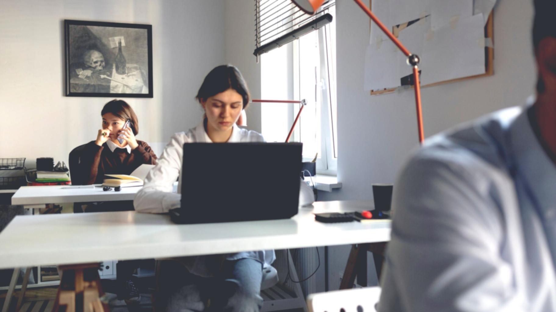 Professional workspace showing budget planning documents and financial reports